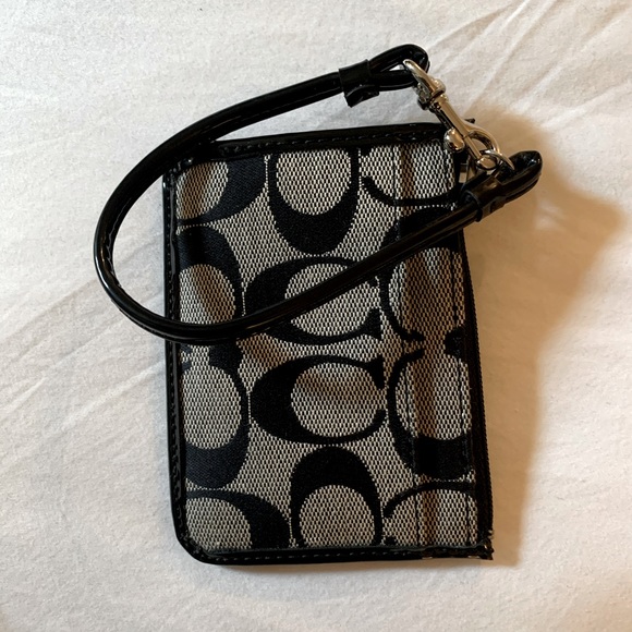 coach card wallet with wrist strap